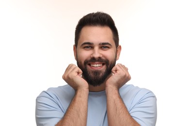 Photo of Man with clean teeth smiling on white background
