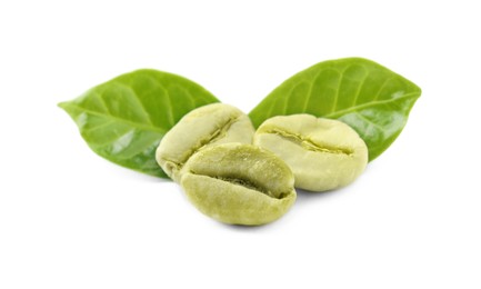 Photo of Pile of green coffee beans and leaves on white background