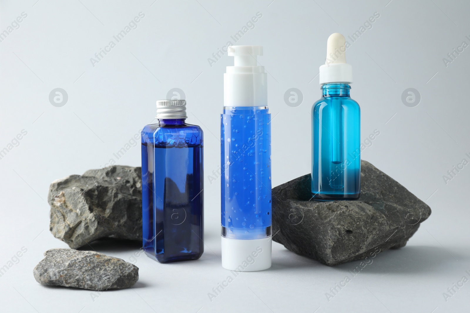 Photo of Set of cosmetic products on light grey background