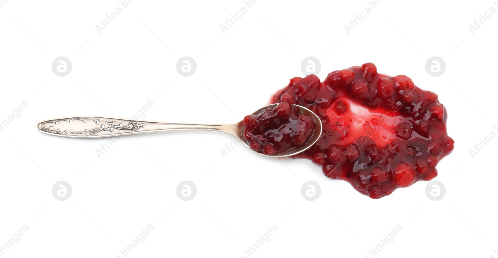 Photo of Spoon and delicious sweet jam isolated on white, top view