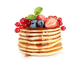 Photo of Stack of delicious pancakes with fresh berries and syrup on white background