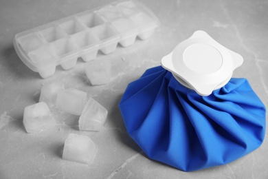 Photo of Composition with ice pack on marble table