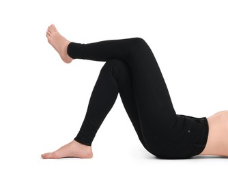 Photo of Woman wearing stylish black jeans on white background, closeup