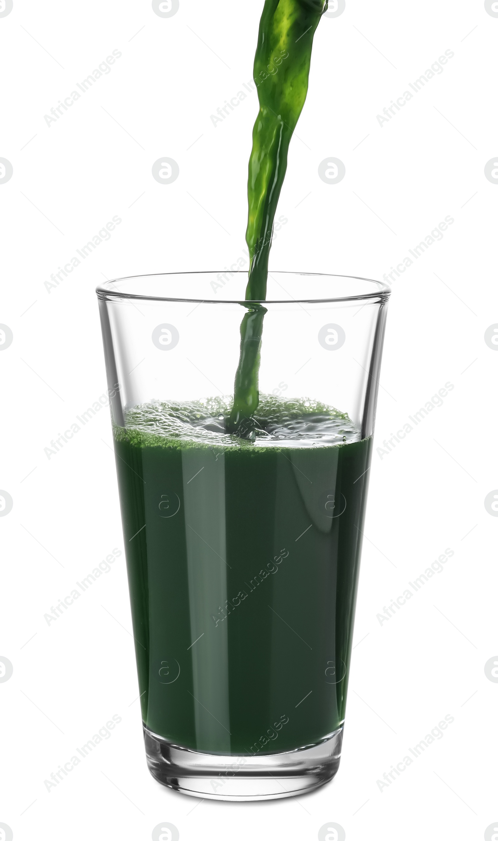 Photo of Pouring fresh juice into glass on white background