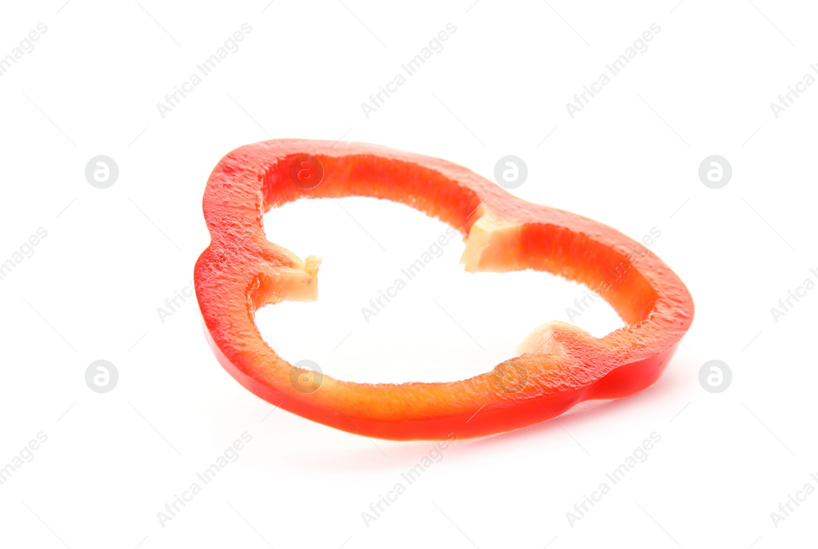 Photo of Slice of ripe paprika pepper on white background