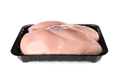 Photo of Container with raw chicken breasts on white background. Fresh meat