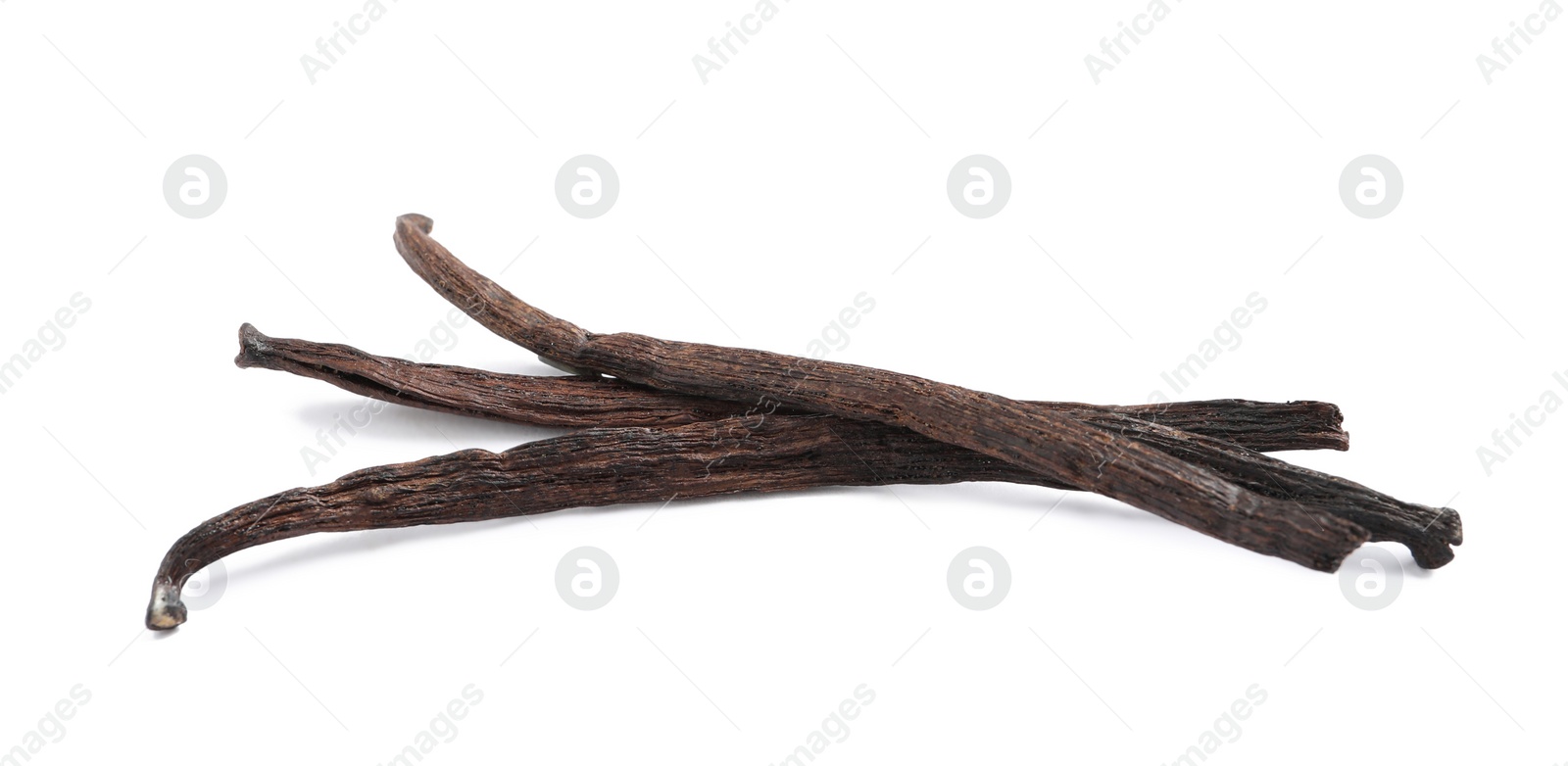 Photo of Dried aromatic vanilla sticks on white background