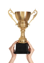Photo of Young woman holding gold trophy cup on white background, closeup