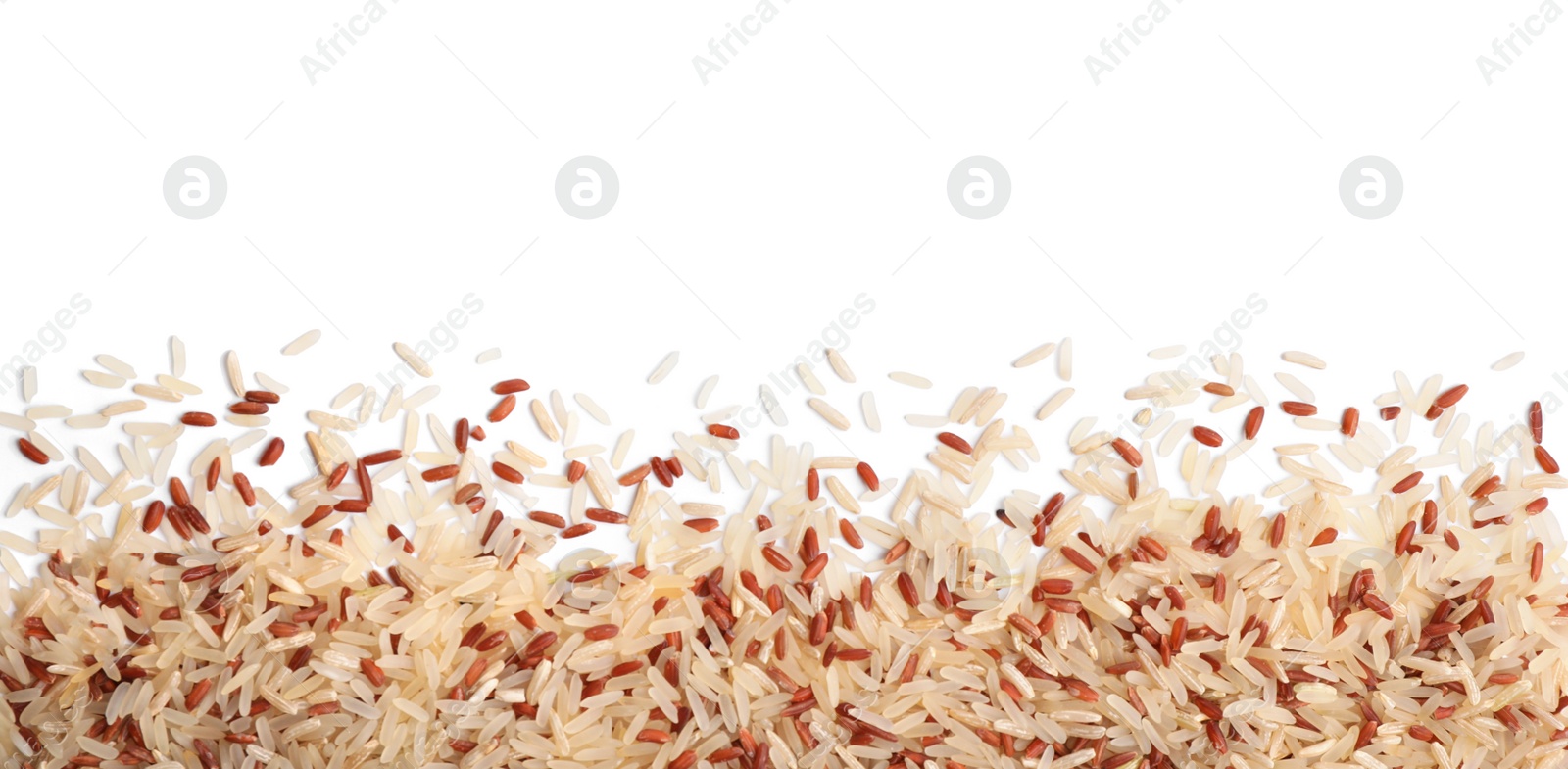 Photo of Mix of brown and polished rice on white background, top view