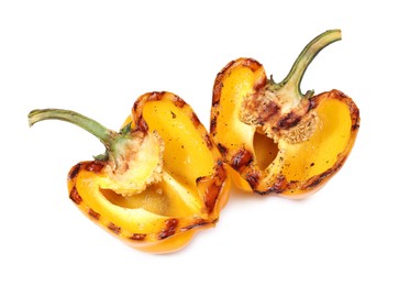 Photo of Halves of grilled yellow bell pepper isolated on white