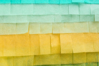 Cut tissue paper in different colors as background