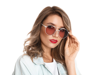 Young woman wearing stylish sunglasses on white background