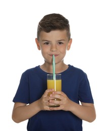 Photo of Little boy drinking juice on white background