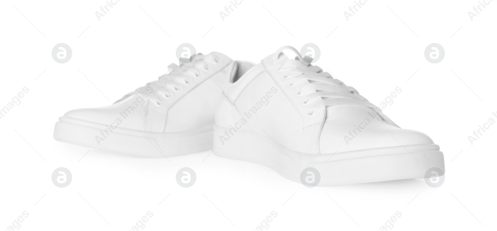 Photo of Pair of stylish sneakers isolated on white