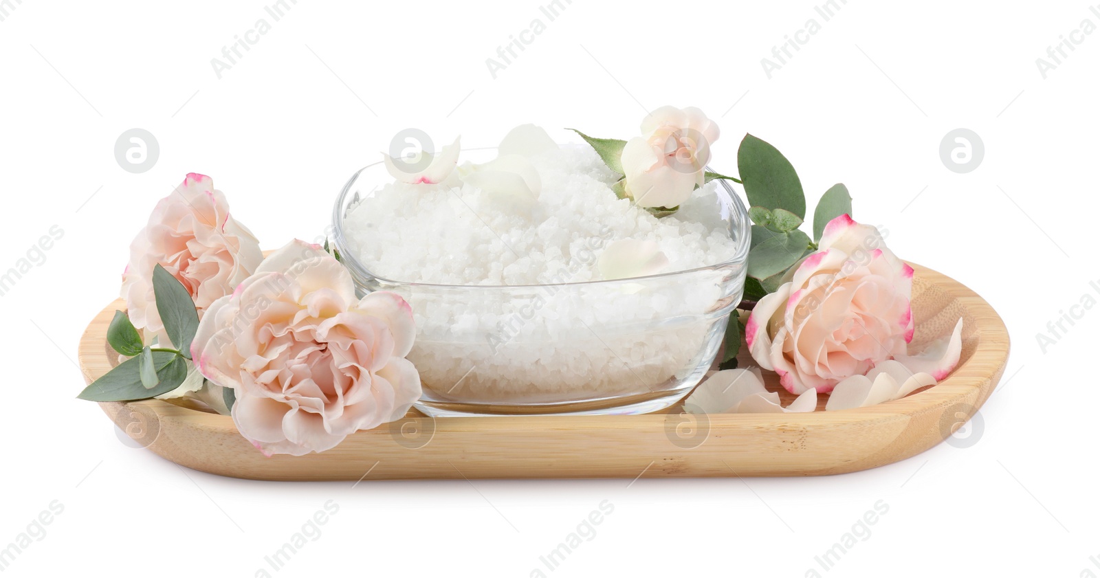 Photo of Glass bowl with natural sea salt and beautiful flowers on white background