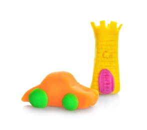 Medieval tower and car made from play dough on white background