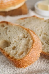 Photo of Slices of freshly baked sodawater bread on napkin, closeup