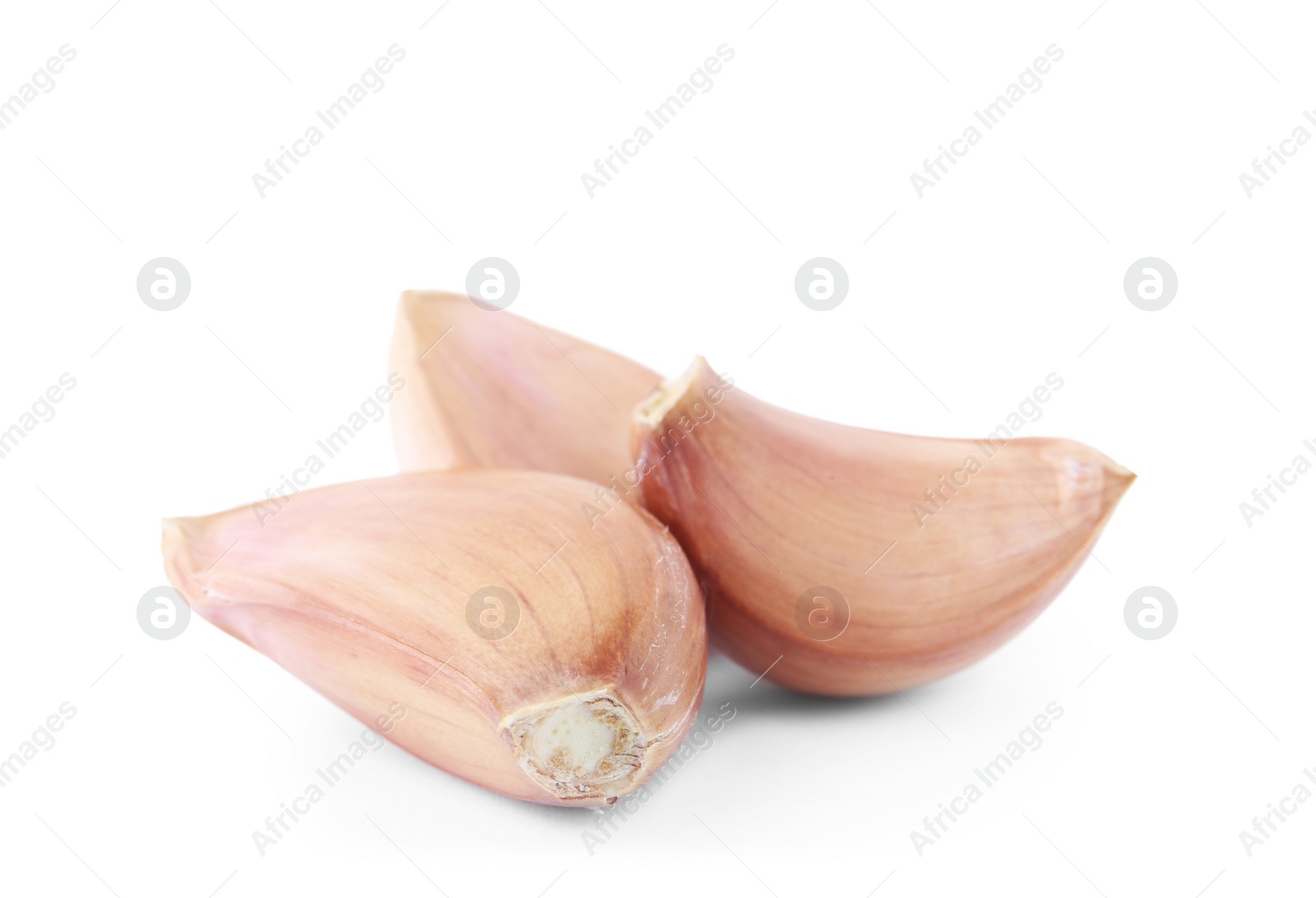 Photo of Fresh unpeeled garlic cloves on white background