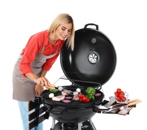 Woman in apron cooking on barbecue grill, white background