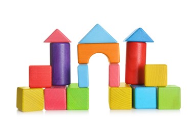 Building made of colorful wooden blocks on white background