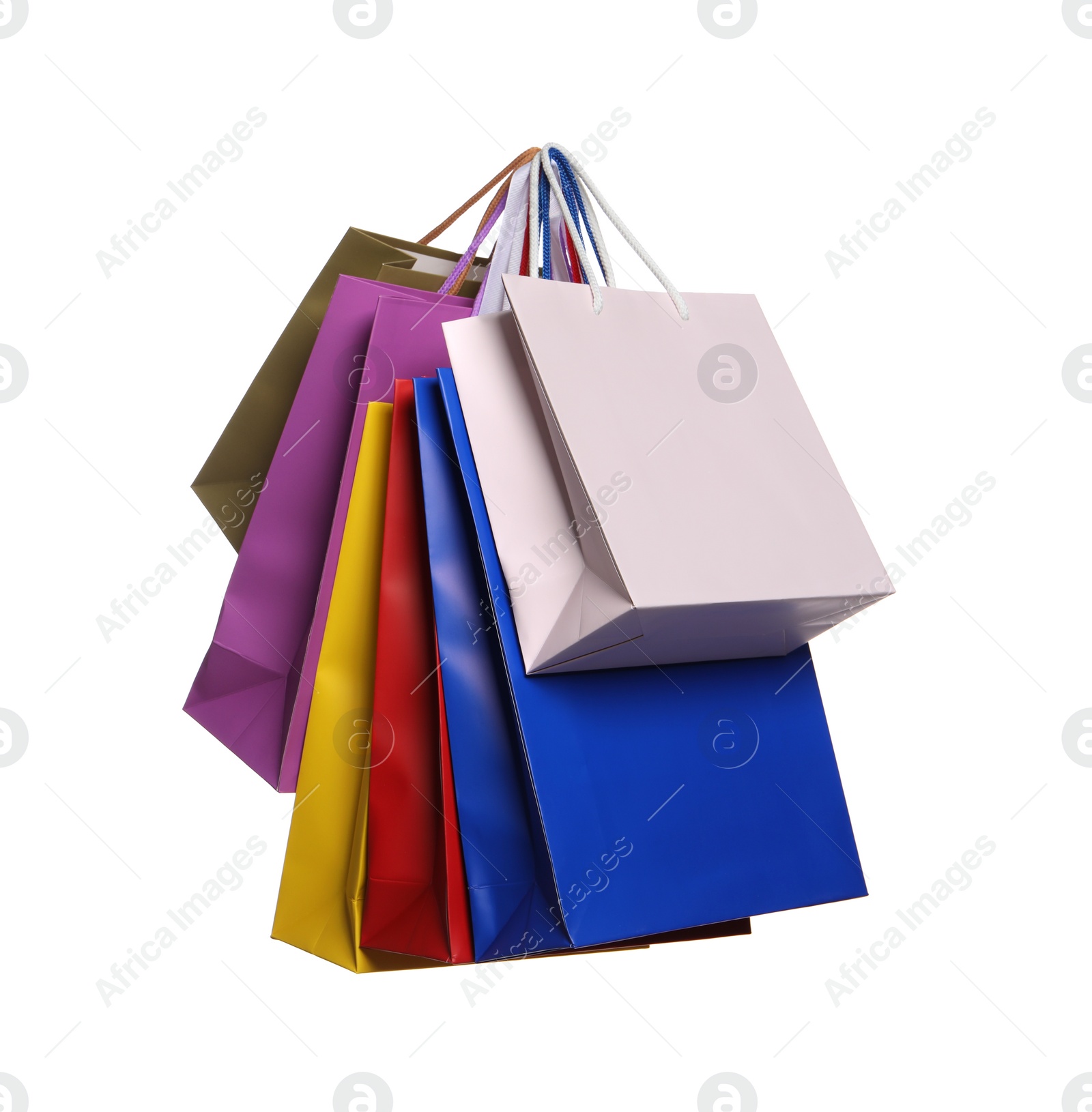 Photo of Colorful paper shopping bags isolated on white