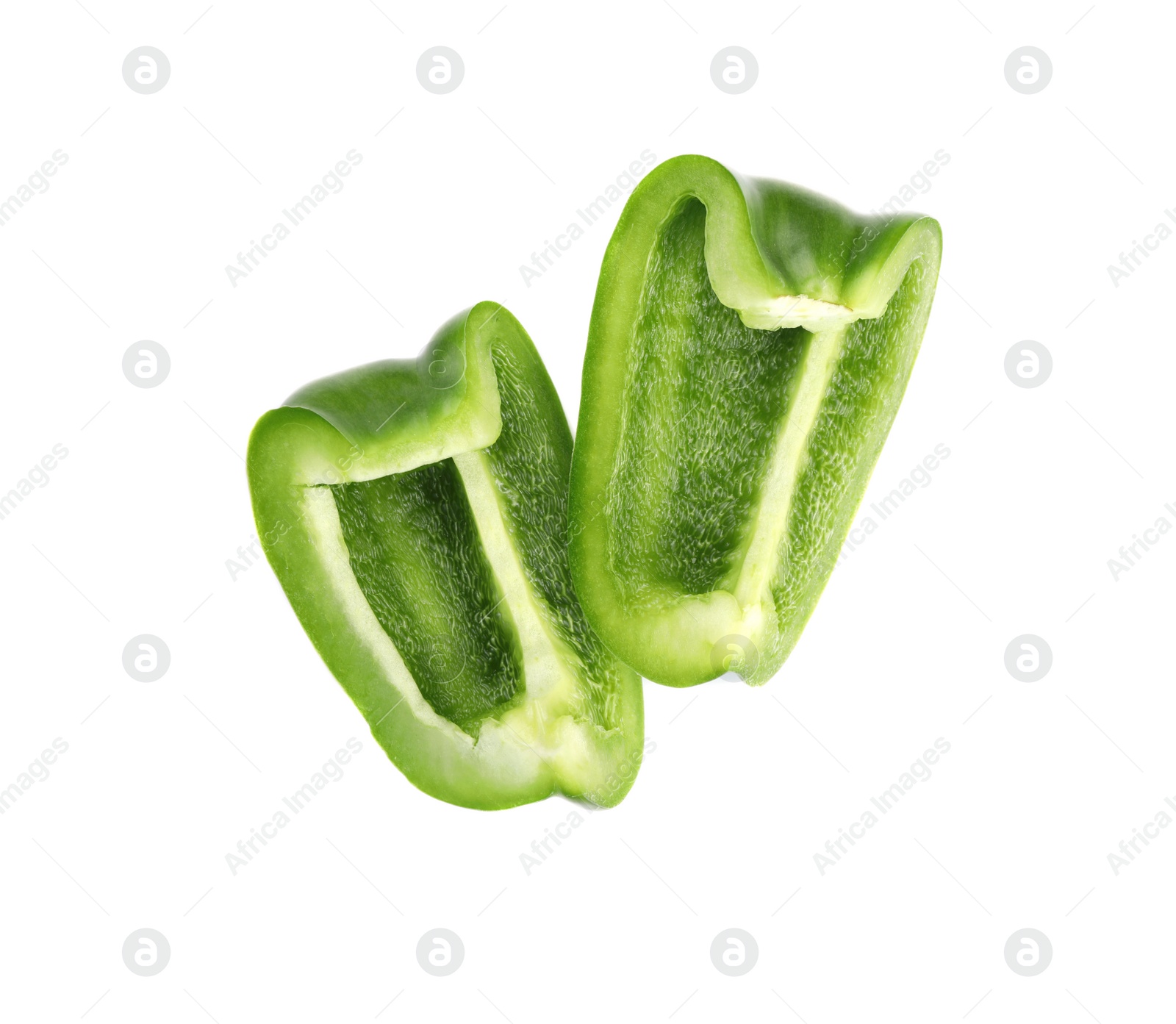 Photo of Slices of fresh green bell pepper on white background, top view