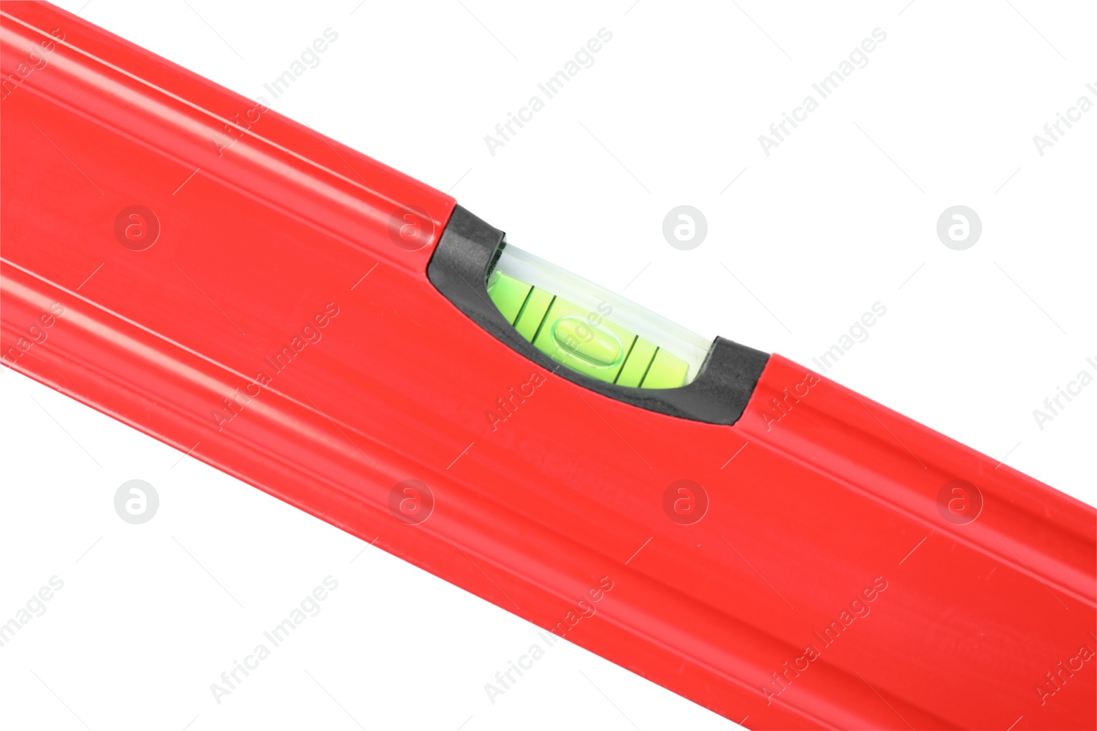 Photo of Red building level isolated on white. Construction tool