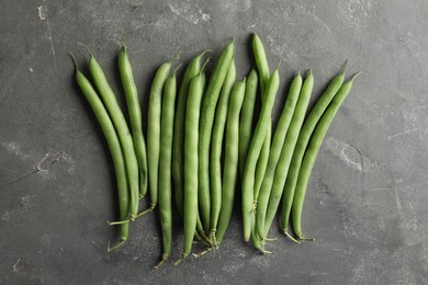 Fresh green beans on grey table, flat lay