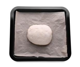 Baking pan with parchment paper and dough isolated on white, top view