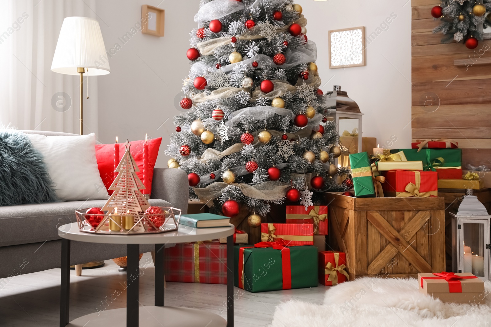 Image of Beautiful Christmas tree in living room. Festive interior