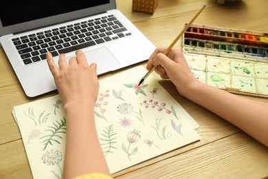 Photo of Woman drawing picture at online art lesson, closeup. Distant learning