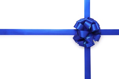 Photo of Blue ribbons with bow on white background, top view
