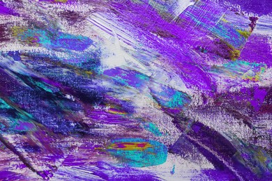 Image of Strokes of colorful acrylic paints on canvas, closeup