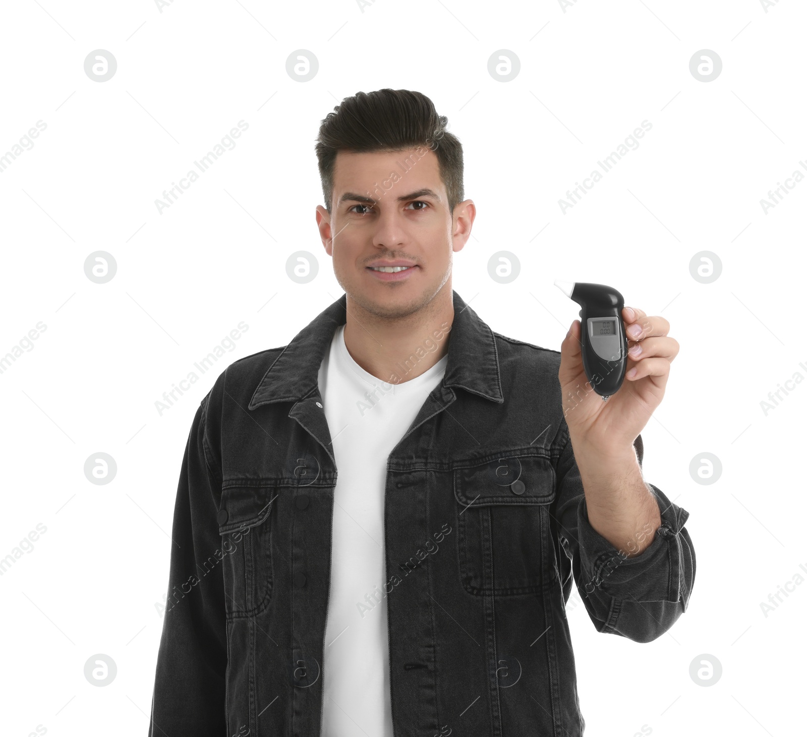 Photo of Man with modern breathalyzer on white background