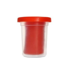 Photo of Plastic container of red play dough isolated on white