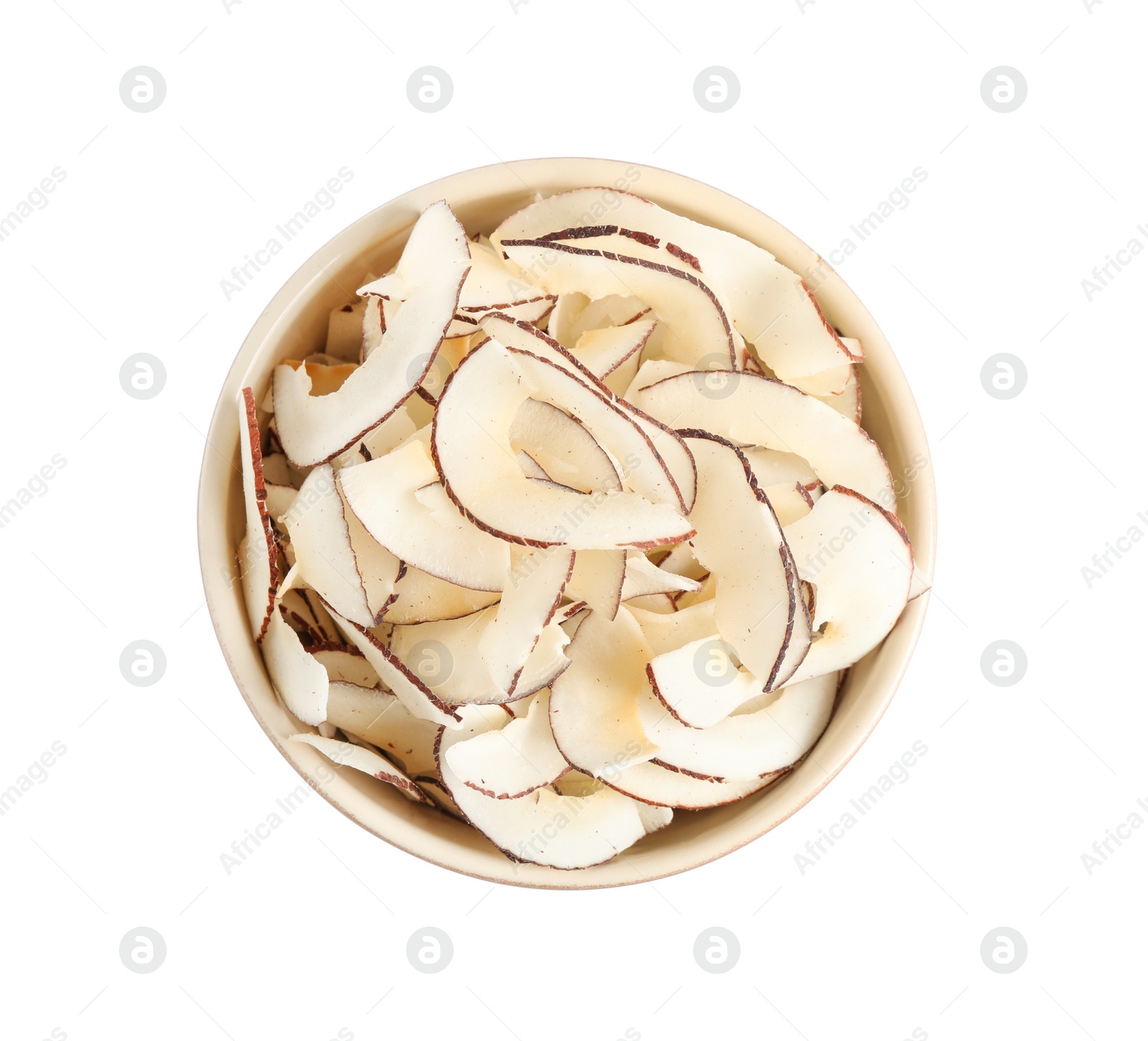 Photo of Tasty coconut chips in bowl isolated on white, top view