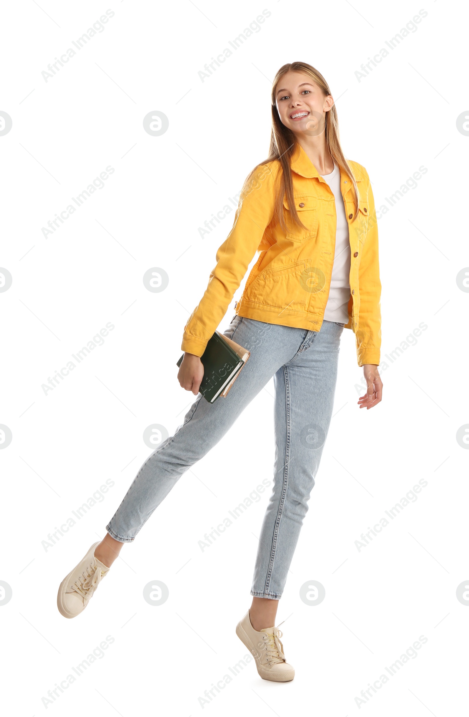 Photo of Teenage student holding books on white background