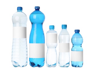 Bottles of pure water with blank labels on white background