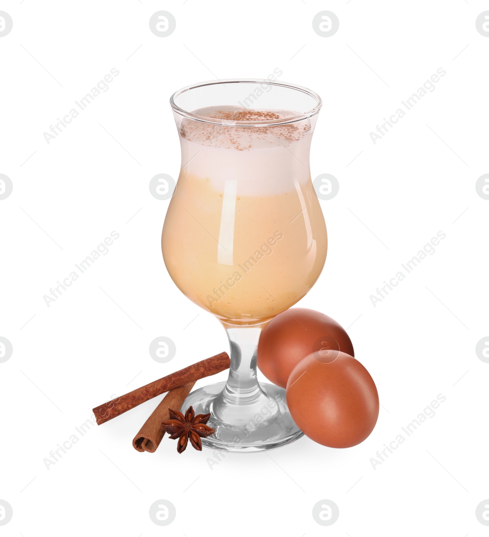 Photo of Delicious eggnog in glass, spices and eggs isolated on white