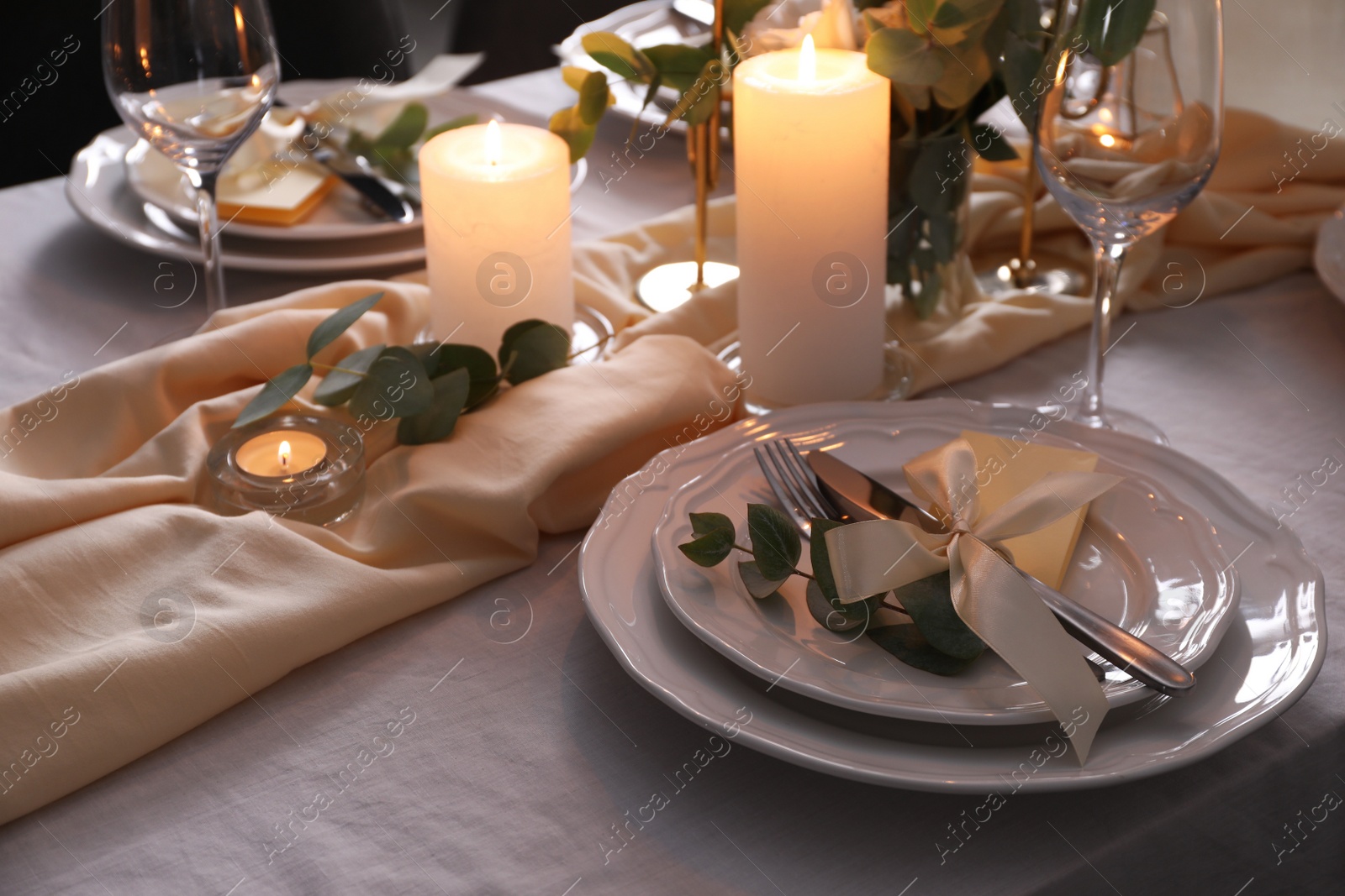 Photo of Festive table setting with beautiful decor and candles