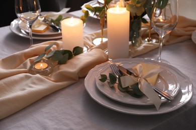 Festive table setting with beautiful decor and candles