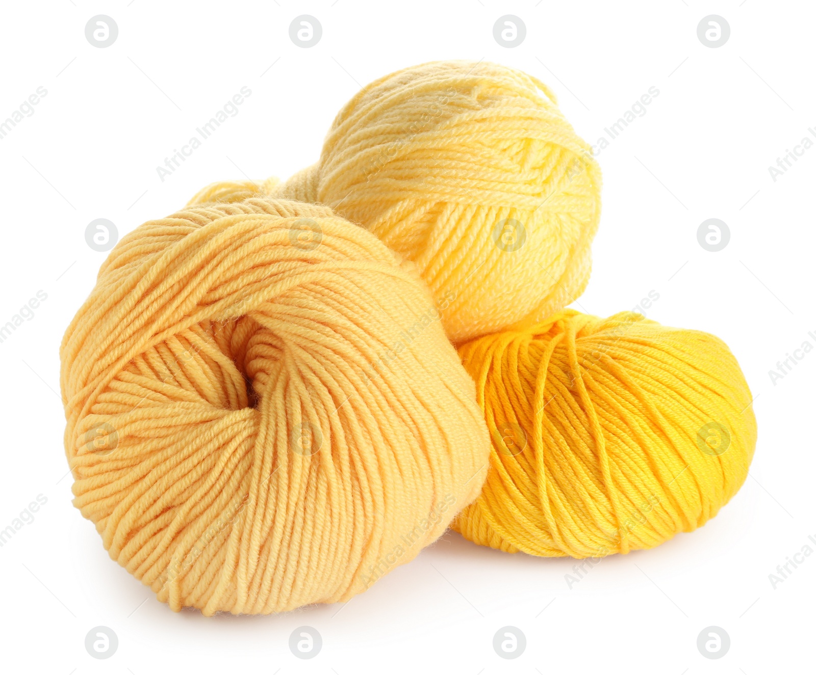 Photo of Different soft colorful woolen yarns on white background