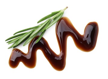 Photo of Balsamic glaze and rosemary on white background, top view