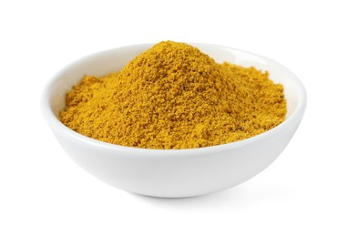 Photo of Dry curry powder in bowl isolated on white