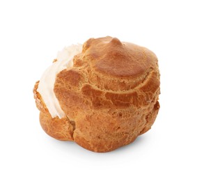 Photo of Delicious profiterole with cream filling isolated on white