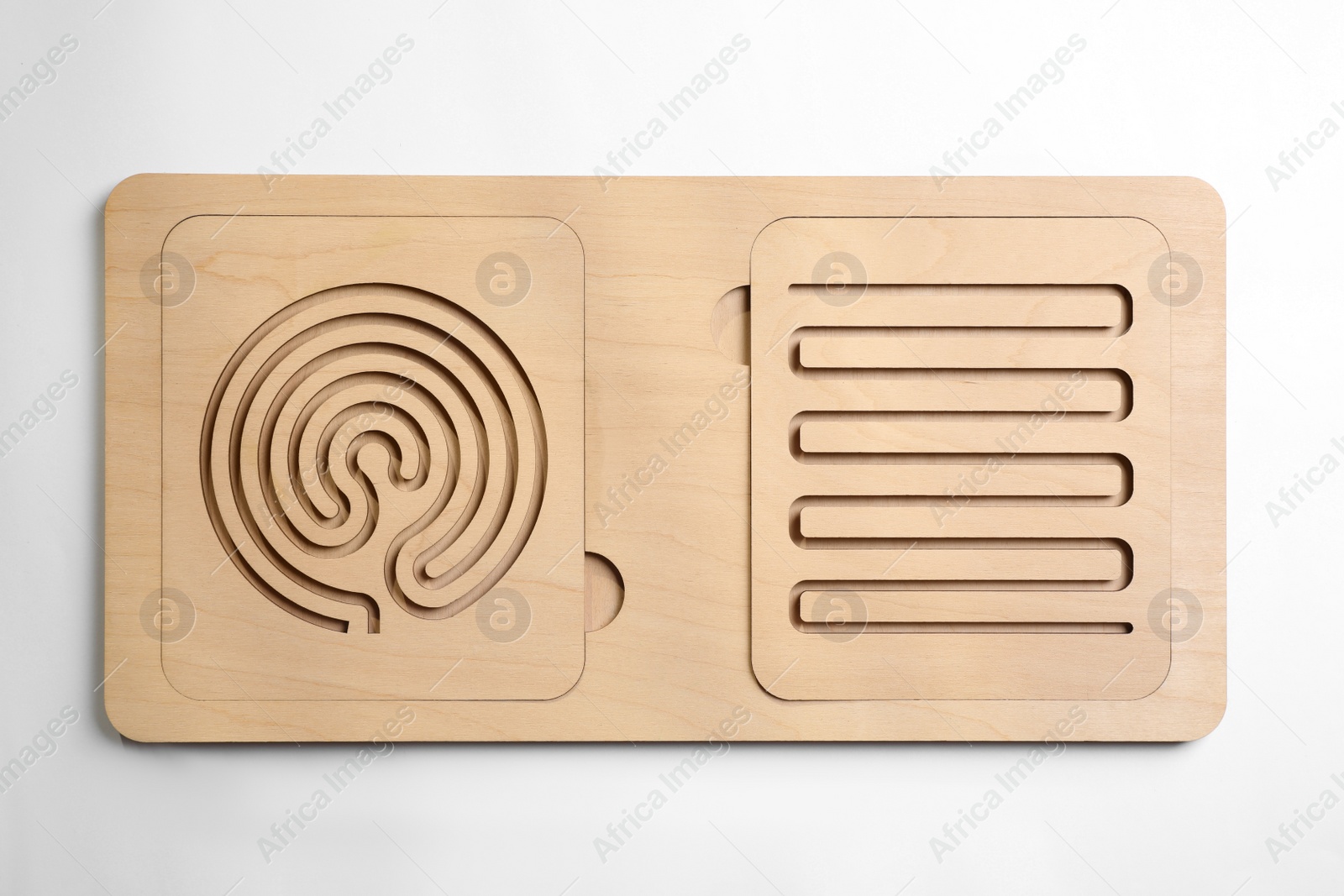 Photo of Wooden finger labyrinths on white background, top view. Montessori toy