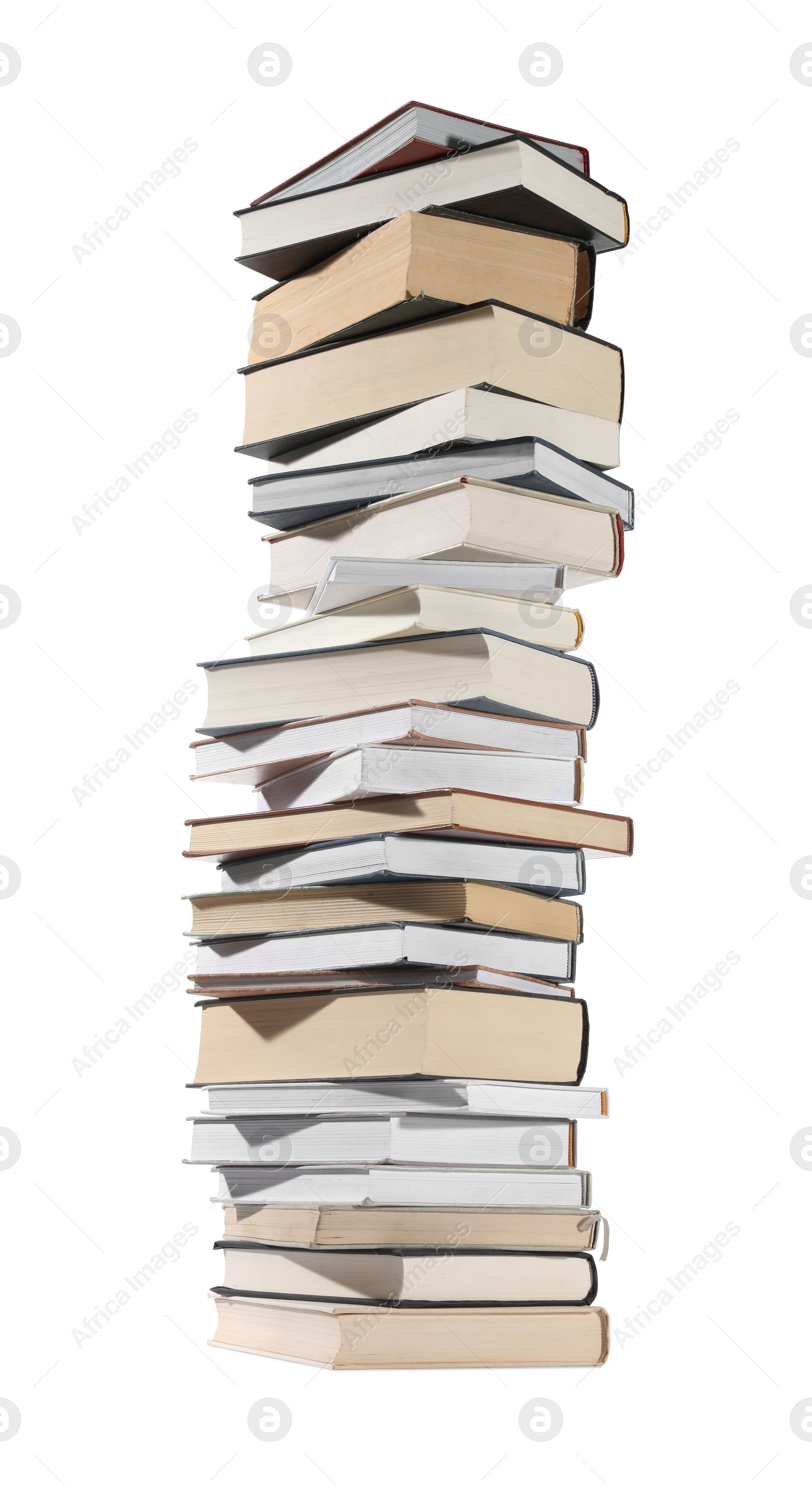 Photo of High stack of many different books isolated on white