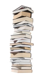 Photo of High stack of many different books isolated on white