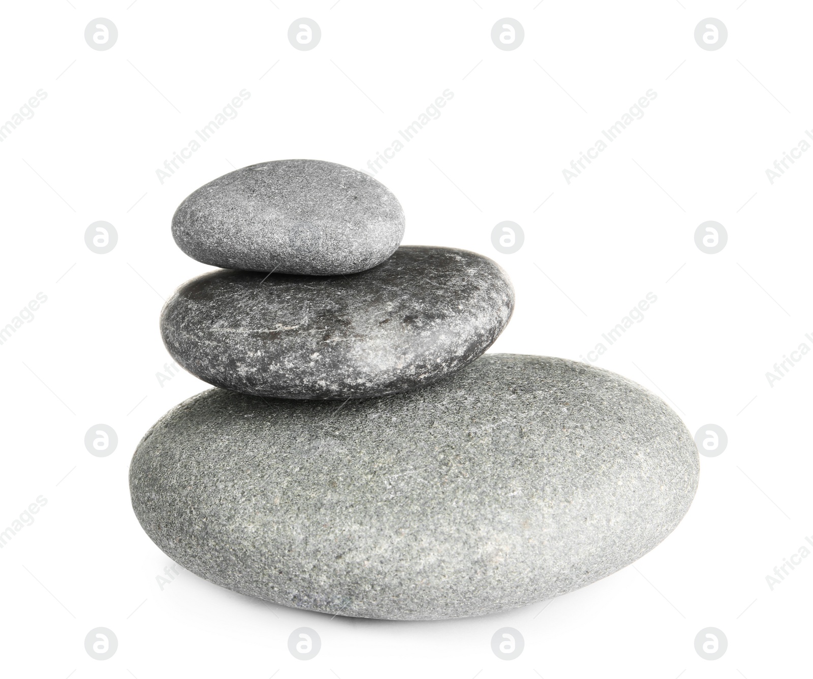 Photo of Stack of zen spa stones on white background