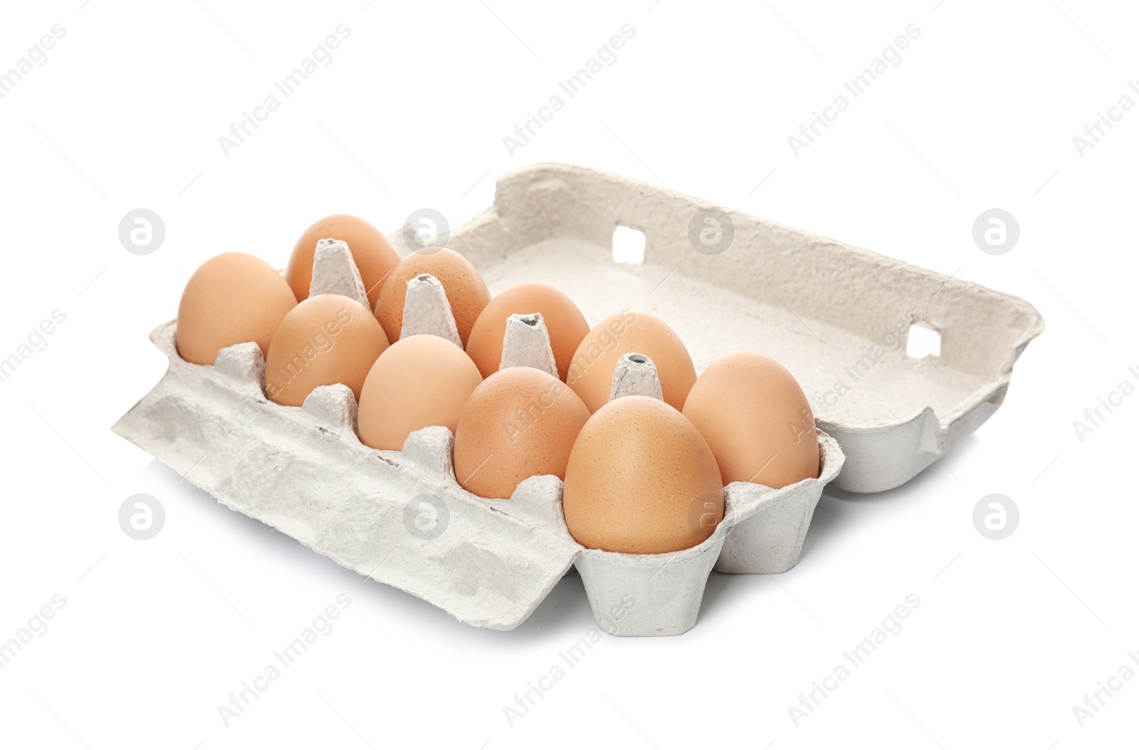 Photo of Carton of raw chicken eggs on white background